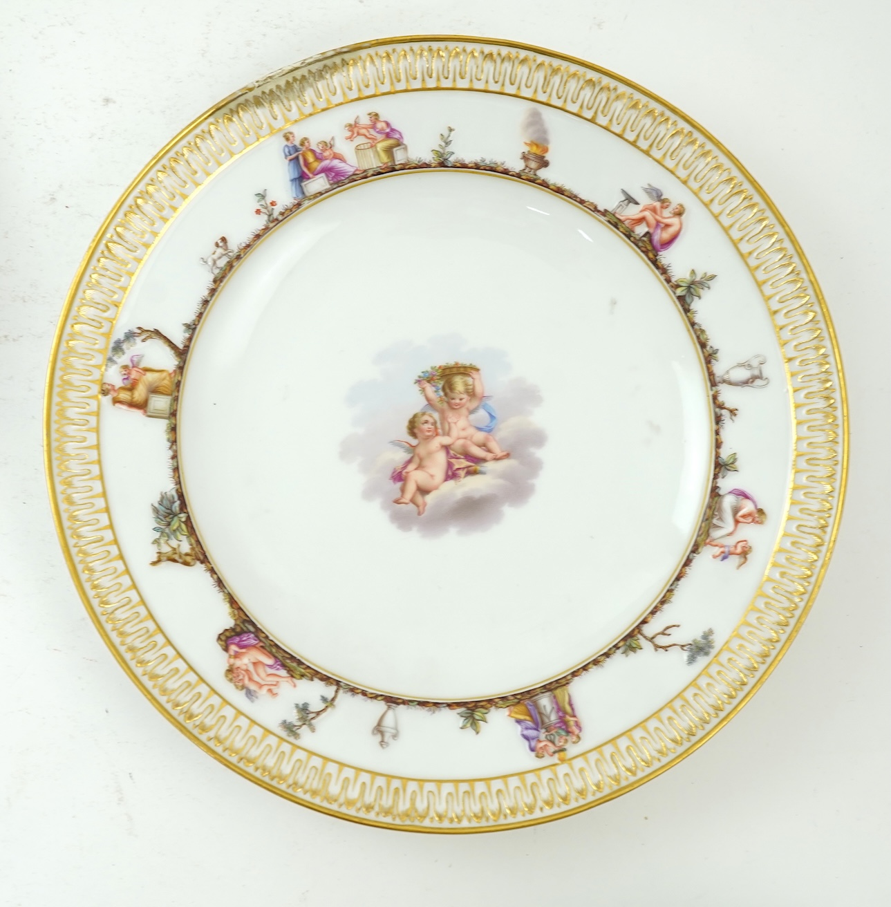 A set of six Meissen plates, decorated in the Capodimonte style, late 19th century